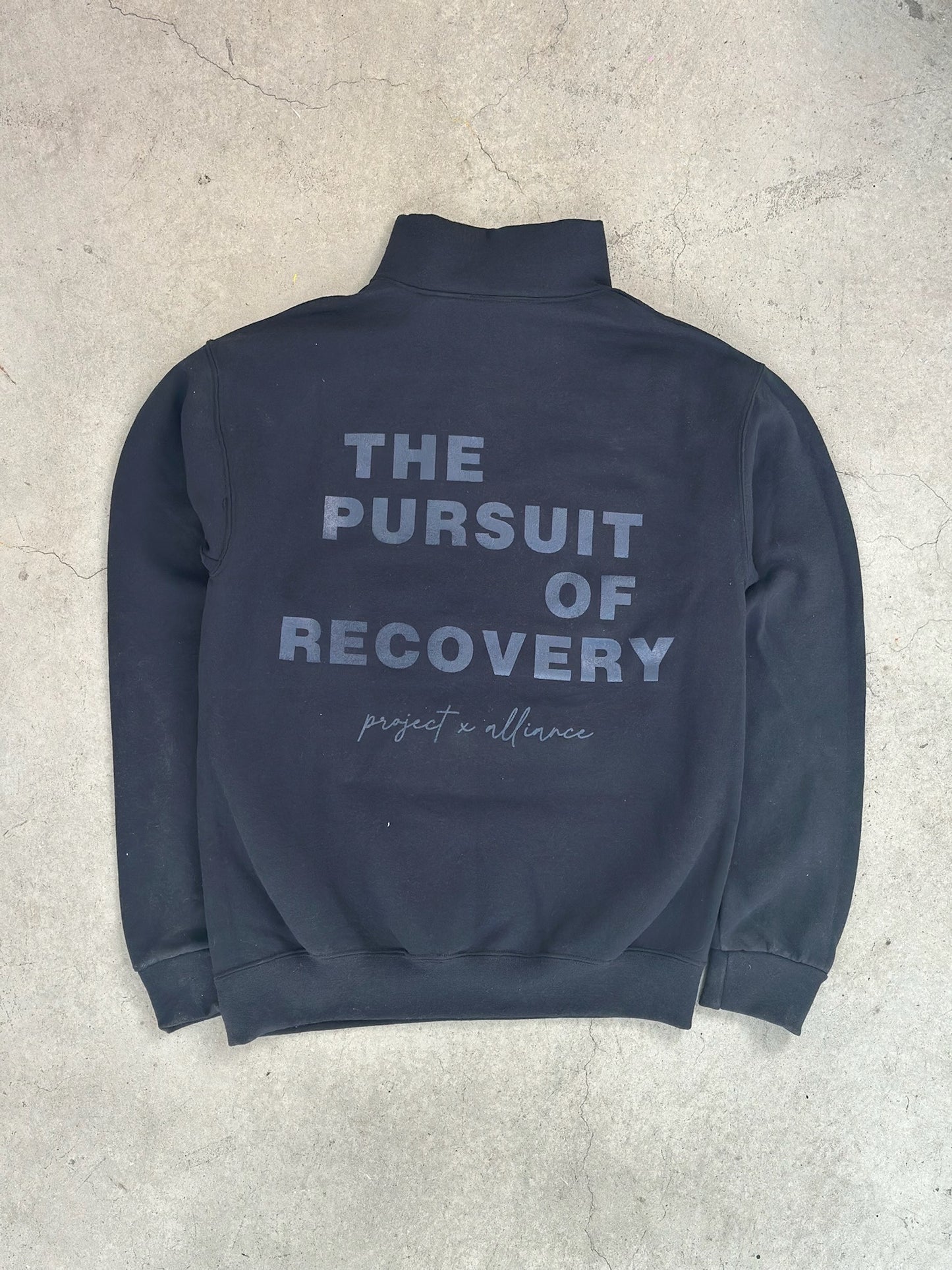The Black Pursuit Quarter Zip Pullover
